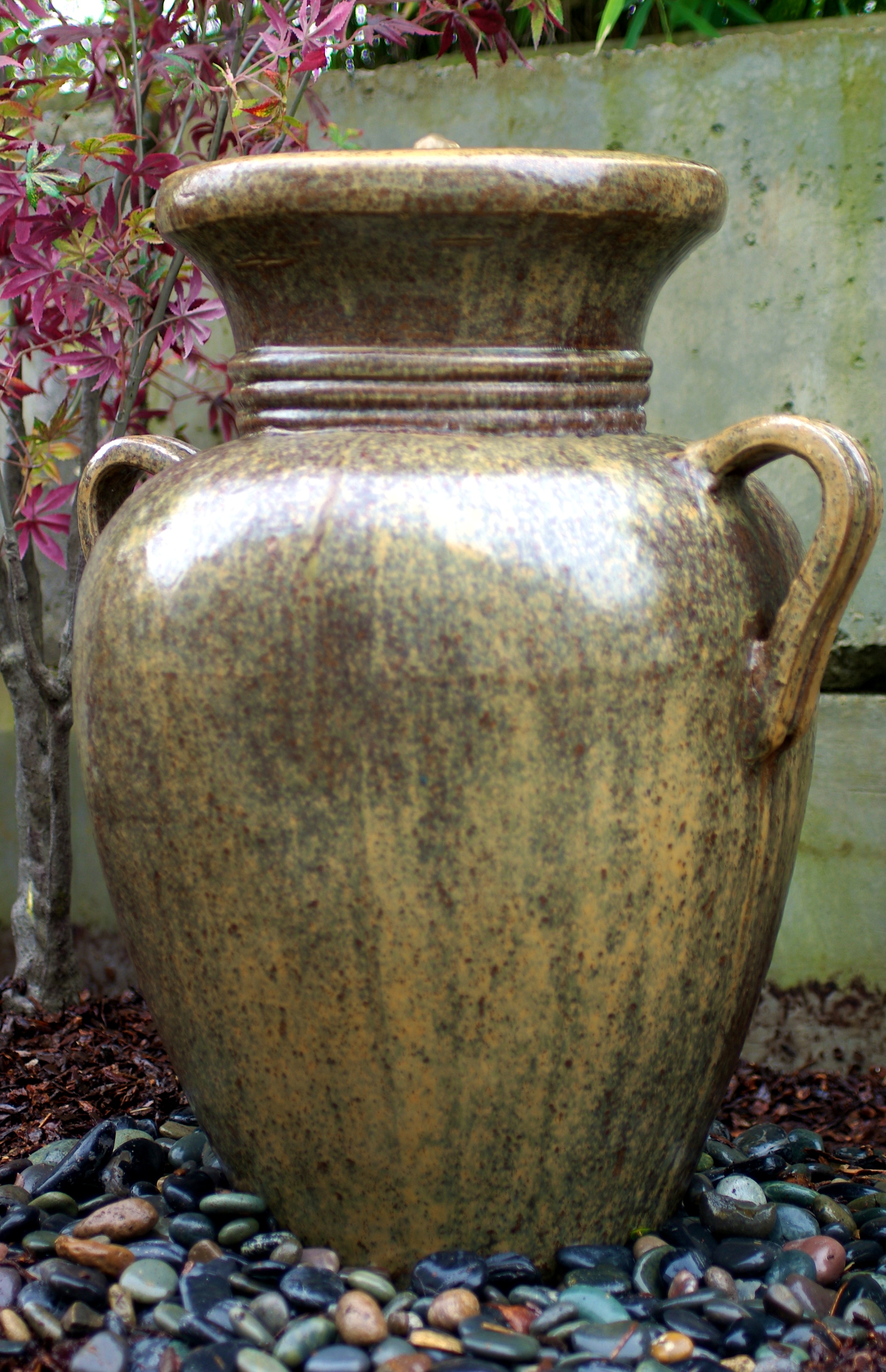 www.LiquidArtFountains.com Handles Pottery, Rust Glaze